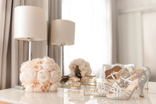 Morning Of Bride, Decor On Table, Wedding Shoes And Flowers. Photograph In Light Neutral Colors. Copy Space