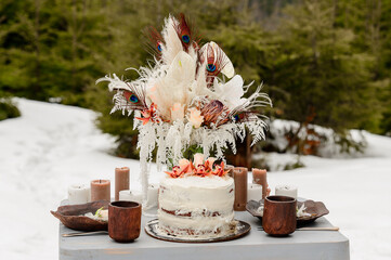 Wall Mural - Wedding cake, wedding celebration in winter, winter landscapes.