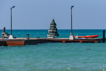 New Year Christmas tree at the beach of Koh Mak. Merry Christmas celebration during holiday trip to South East Asia Thailand sunny island.