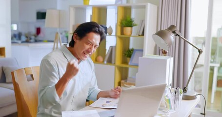 Wall Mural - man uses laptop excited