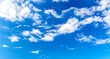 Blue sky background with clouds. Can be used as a natural background.