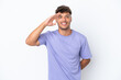 © luismolinero - Young caucasian handsome man isolated on white background saluting with hand with happy expression