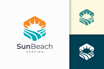 Ocean or sea logo in abstract water wave and sun represent adventure