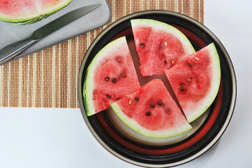 Wall Mural - watermelon slices on a plate - red watermelon pulp