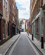 City of London side street. A narrow side road with a contrast of old and new architecture in EC1.