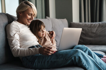 Canvas Print - Happy young mother and her little daughter