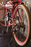 Fototapeta Na drzwi - Red old bike with modified engine. Close-up bicycle rear wheel