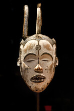 African Mask Isolated On A Dark Background