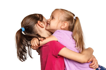 Hugs of two little girls. Two sisters hugging on white background