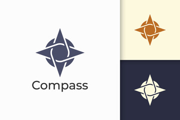 Wall Mural - Compass logo in modern and abstract shape for tech company