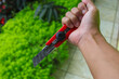 an Asian man holding red cutter knife tries to harm himself. Suicide illustration stock images.