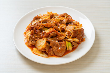 Wall Mural - stir-fried pork with Korean spicy paste and kimchi