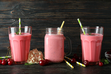 Wall Mural - Cherry smoothie and ingredients on rustic wooden table