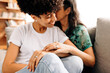 © (JLco) Julia Amaral - Married female couple bonding at home