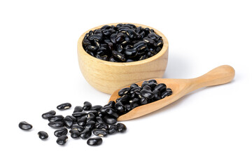 Wall Mural - Black beans (Urad dal, black gram, vigna mungo bean) in wooden bowl and scoop isolated on white background. 