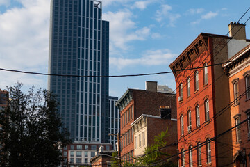 Wall Mural - Row of Colorful Old Brick Buildings and a Modern Skyscraper in Downtown Jersey City New Jersey