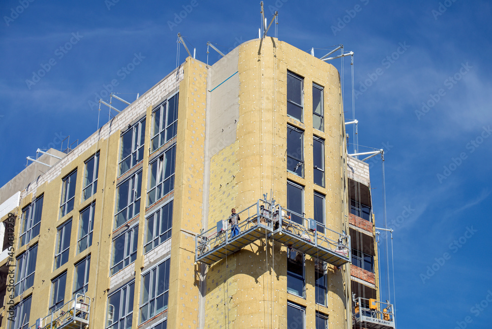 Building external wall thermal insulation with mineral wool. Exterior ...