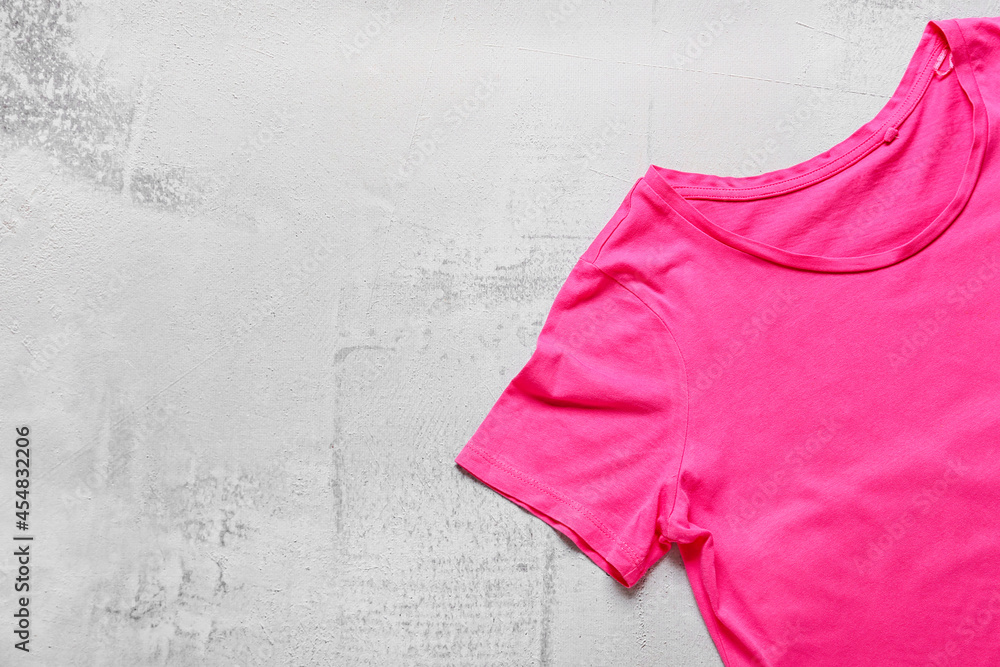 Stylish t-shirt on light background