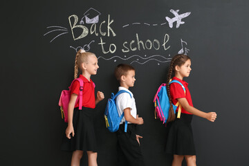 Sticker - Cute pupils on dark background with text BACK TO SCHOOL