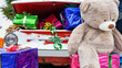 Christmas decorated classic car with teddy bear. A vintage car decorated for New year holidays loaded with festive gifts. Xmas background. Space for text.