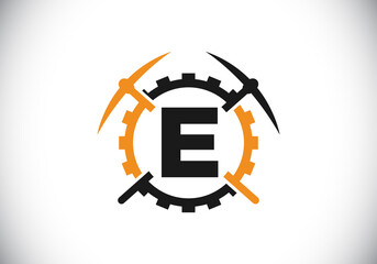 Wall Mural - Initial E monogram letter alphabet with pickaxe and gear sign. Mining logo design concept. Modern vector logo for mining business and company identity.