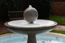 Outdoors  Sphere Shaped Fountain With Gentle Flowing Water