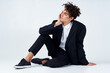© SHOTPRIME STUDIO - guy in black jacket sitting on the floor fashion elegant style