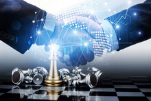 Double Exposure Image Of Business Team Work Handshake With Effect Graph Chart And Network Connection Diagram With Chess Board Game Competition, Planning, Teamwork And Business Strategy Concept