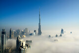 Fototapeta Sypialnia - Dubai city view in Fog, United Arab Emirates