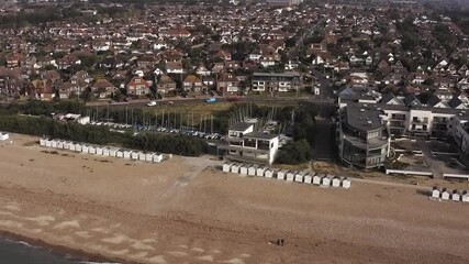 Wall Mural - Aerial of Goring by Sea and Marine Crescent running behind the Sailing Club and the beach huts.