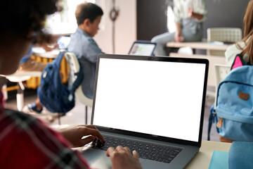 african junior school kid girl student using laptop computer with white blank empty mockup screen at