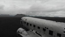 Drone 4k: Iceland Airplane wreck on the black beach by rain - Sólheimasandur raw footage