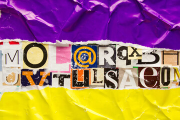 Wall Mural - Torn and crumpled purple and yellow paper poster on bright colorful collage of magazine paper pieces and clippings with letters and numbers background.