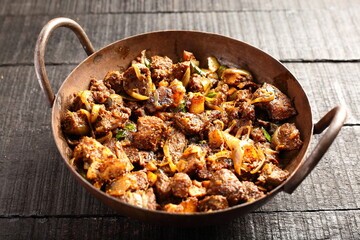 Homemade spicy beef meat fry, from Indian cuisine.