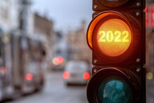 A City Crossing With A Semaphore. Orange Light With Text 2022 In Semaphore. Symbolic New Year Approaching Concept