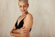 © Jacob Lund - Senior woman embracing her aging body