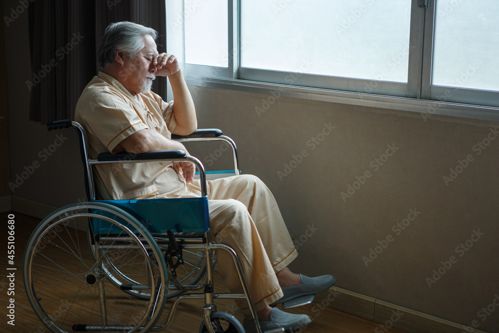 Asian Senior Man Patient Sit On Wheelchair Holding Head With Hands ...