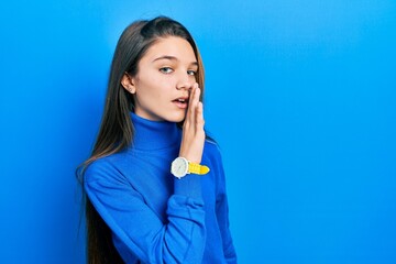 Sticker - Young brunette girl wearing turtleneck sweater hand on mouth telling secret rumor, whispering malicious talk conversation