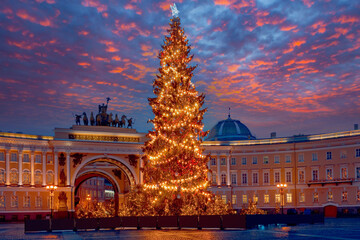 Wall Mural - Main Christmas tree of Saint-Petersburg. Christmas in Russia. Christmas tree on the background of the arch of general staff and the beautiful sky. Palace Square. Petersburg in holiday anticipation.