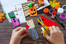 Instructions, Step 5. Halloween Ghost And Vampire Toy Gift Stics Puppets On Wooden Table. Handmade. Project Of Children's Creativity, Handicrafts, Crafts For Kids.