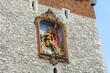 Baroque relief depicting St. Florian. Florian Tower in Krakow. View from Florianskaya street. Poland
