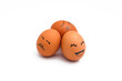 © Jamaludinyusup - a Group of brown chicken eggs with happy, annoyed, and tired faces isolated on white background.