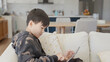 © SewcreamStudio - Mixed Asian preteen teen boy making video calling with digital tablet at home, using zoom online virtual class , social distancing, homeschooling, remote learning, new normal concept