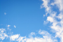 Background With White Clouds From The Corner Edge And Blue Sky