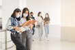 © EduLife Photos - Asian college students back to school with protective face mask studying in the campus