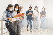 © EduLife Photos - Asian college students back to school with protective face mask studying in the campus