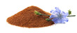 Pile of chicory powder and flower on white background