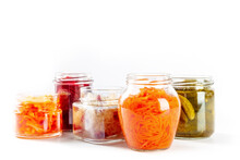 Fermented, Probiotic Food On A White Background. Canned Vegetables. Pickled Carrot, Sauerkraut And Other Organic Preserves In Mason Jars. Healthy Vegan Cooking Concept With Copy Space