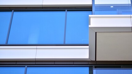 Wall Mural - Condominium and apartment building with  symmetrical modern architecture in the city downtown.