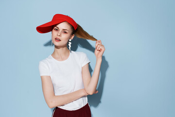 Poster - cheerful young woman in red cap fashion summer style Glamor studio